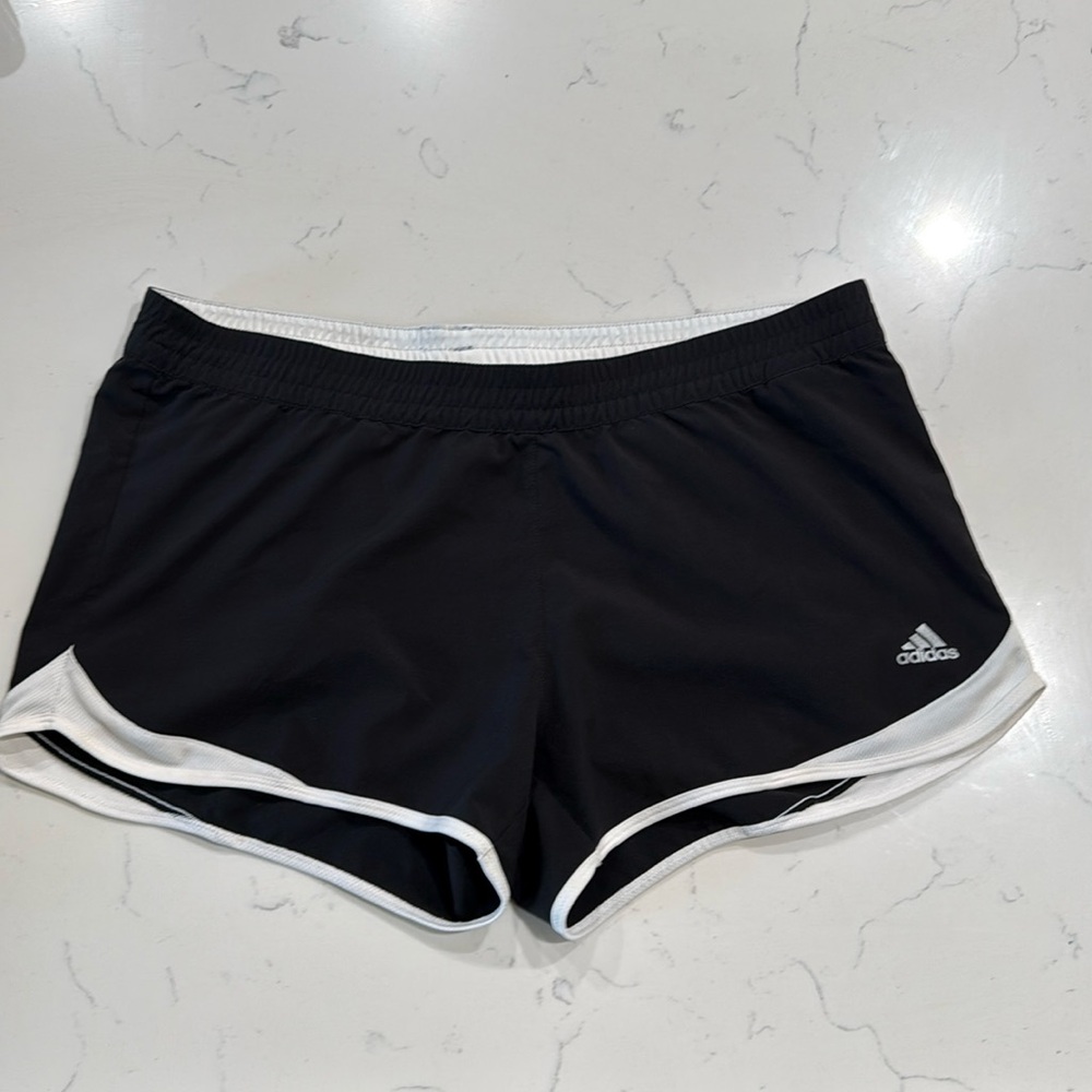 Adidas shorts. Size 12-14. Black and white.